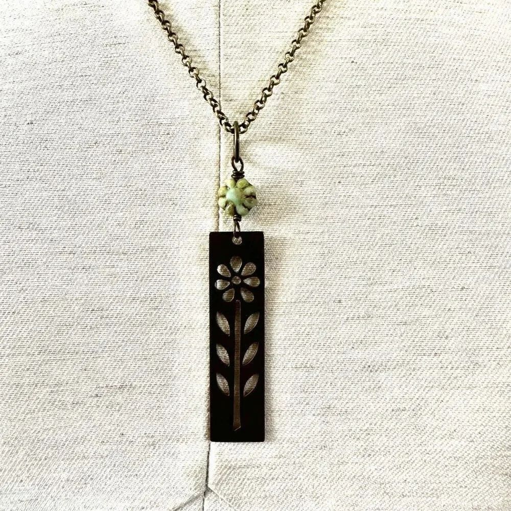 Long flower pendant necklace